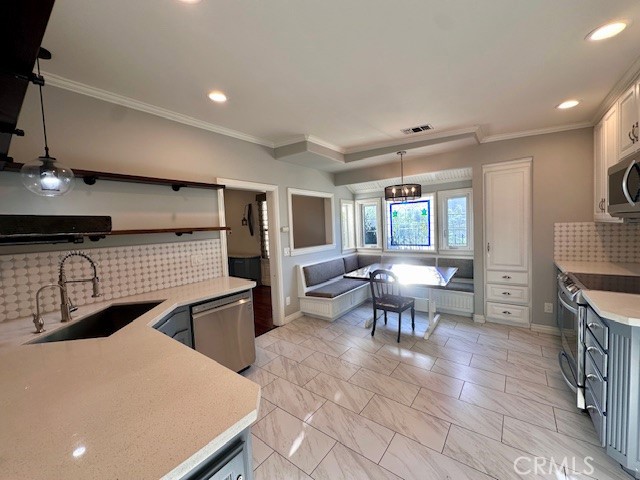 519 East Stuart Avenue Redlands, CA 92374 - Photo 25 of 36 a lobby with furniture and a table