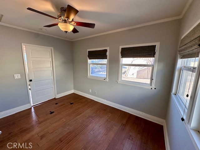 519 East Stuart Avenue Redlands, CA 92374 - Photo 26 of 36 an empty room with wooden floor fan and windows