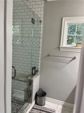 a bathroom with a sink and a shower