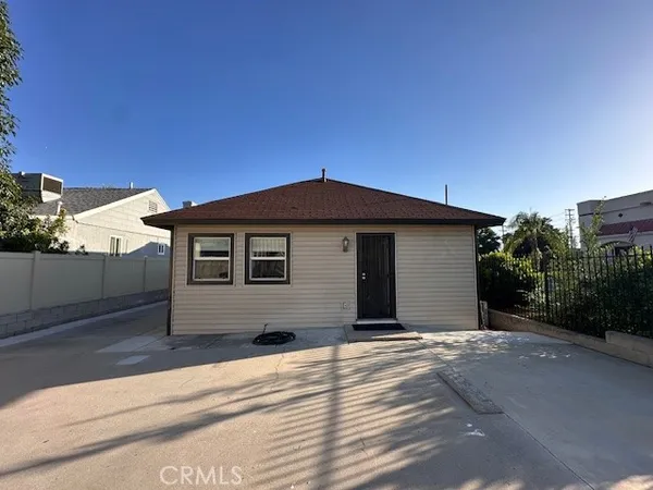 a front view of a house with a garage
