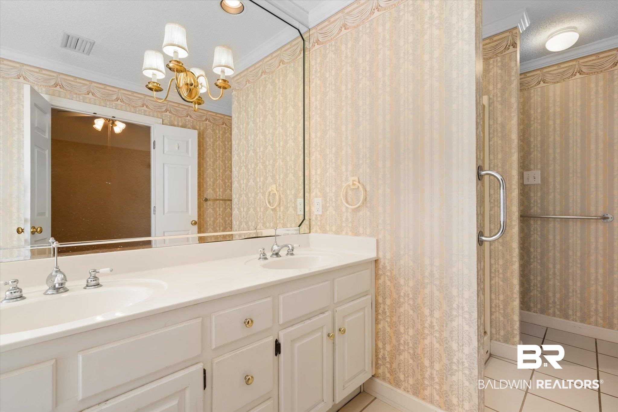 2220 Irongate Court Mobile, AL 36695 - Photo 13 of 20 Full bath featuring tile patterned flooring, a sink, baseboards, and wallpapered walls
