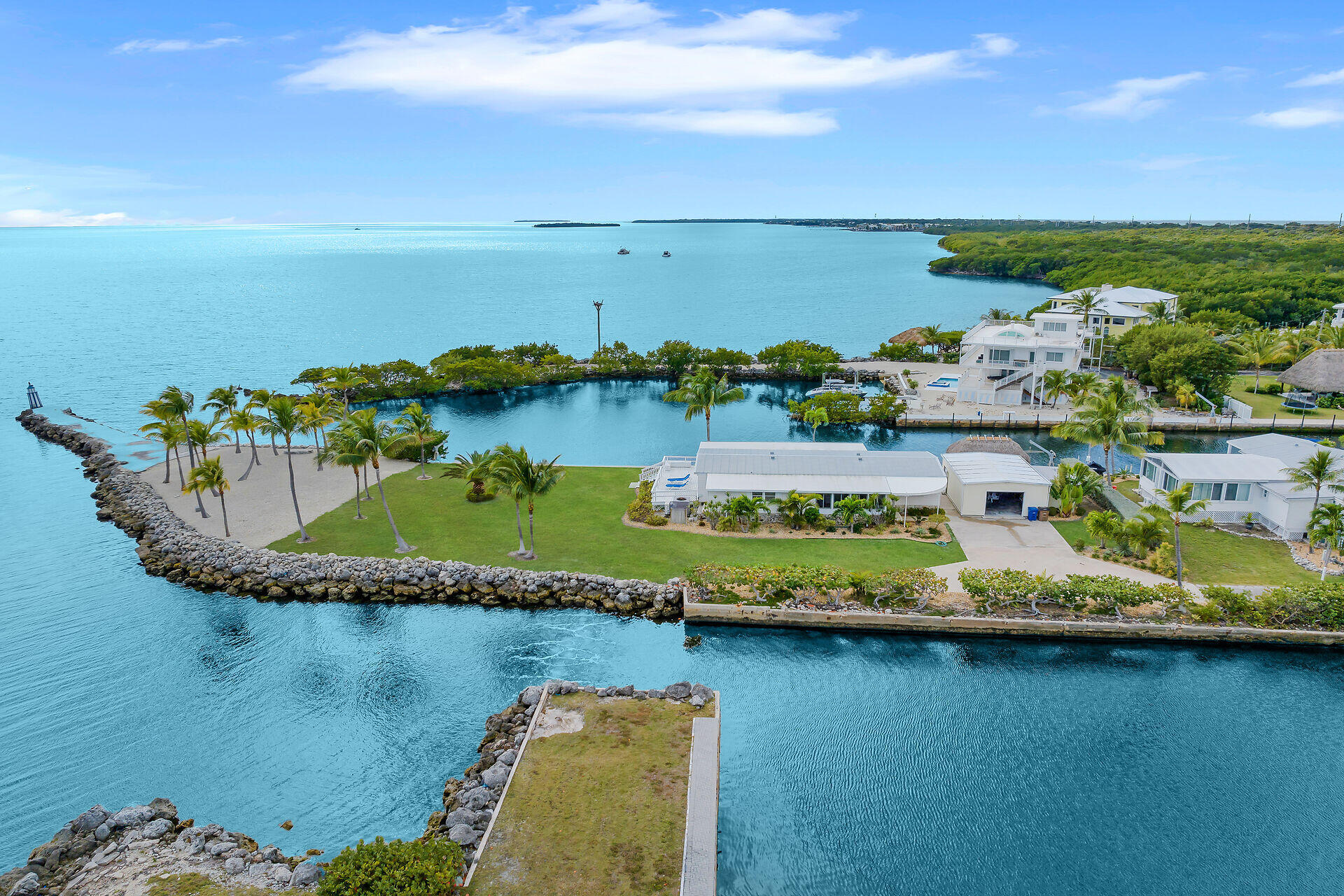 76 Ocean Drive Key Largo, FL 33037 - Photo 4 of 59 rip rap seawall