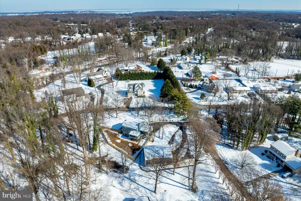 a view of a house with a tree