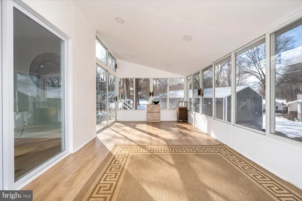 a large white room with a large window