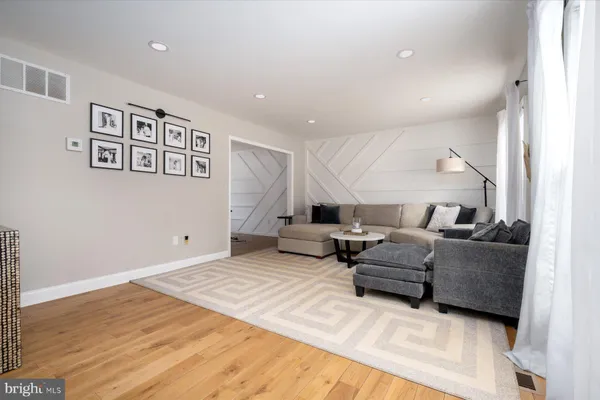 a living room with furniture and a couch