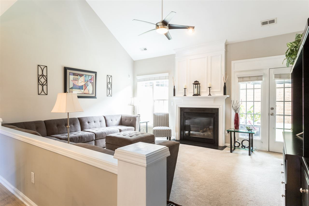7718 Tori Trace Raleigh, NC 27613 - Photo 12 of 30 Family room with gas log fireplace