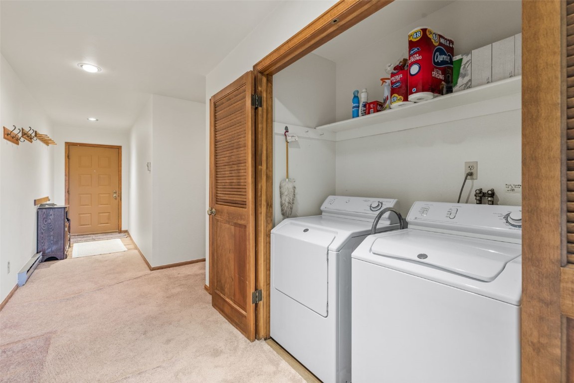 4624 Ryan Gulch Road, Unit 4624 Silverthorne, CO 80498 - Photo 20 of 31 a view of storage and utility room with washer and dryer