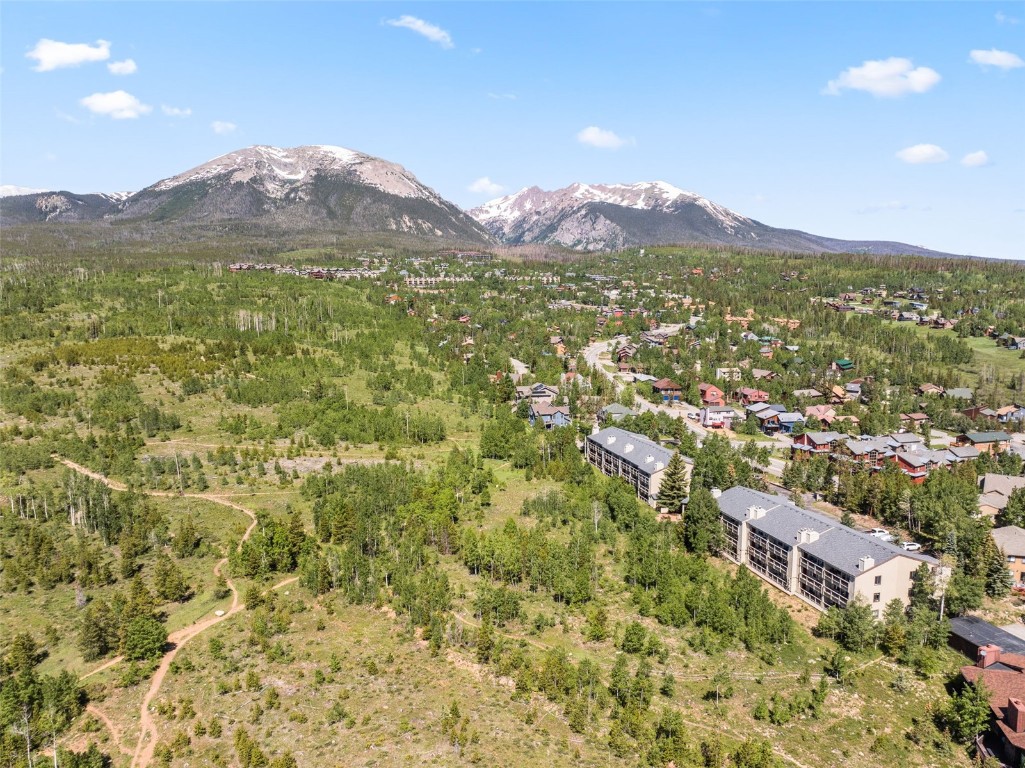 4624 Ryan Gulch Road, Unit 4624 Silverthorne, CO 80498 - Photo 30 of 31 a view of a town with mountains in the background