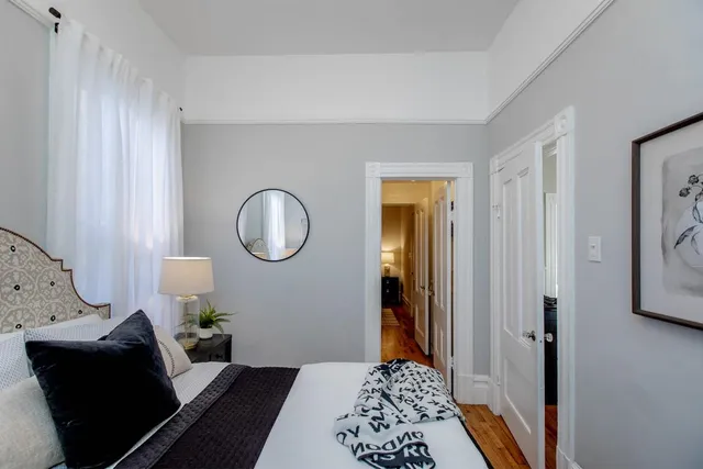 a view of backyard with outdoor seating a patio and a garden