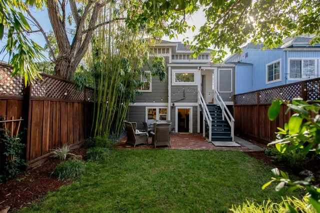a view of a living room and a balcony