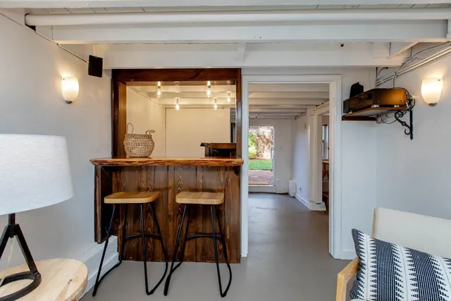 a bedroom with a bed and a walk in closet