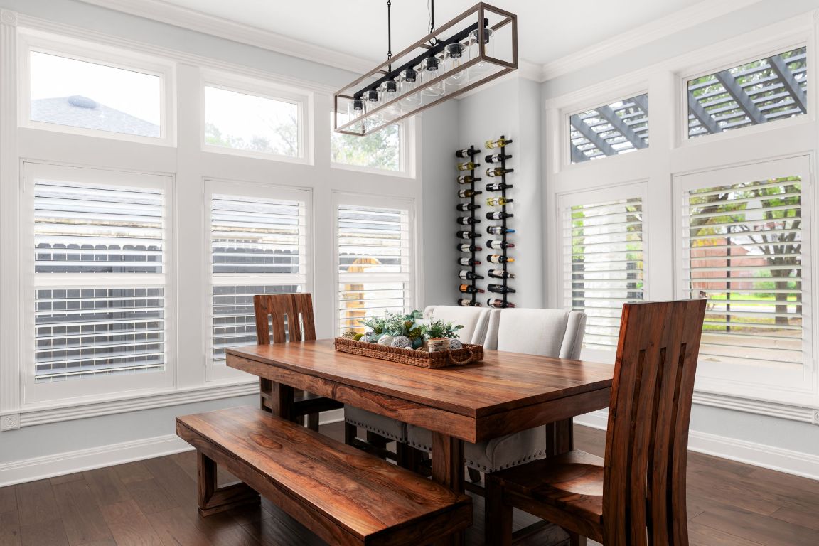 10218 Braemar Drive Austin, TX 78747 - Photo 14 of 34 Dining space with crown molding, dark wood finished floors, and healthy amount of natural light