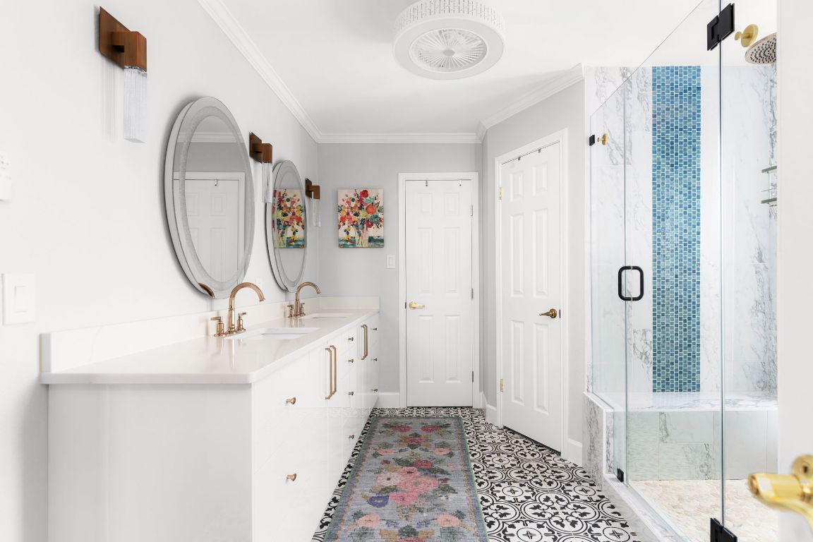 10218 Braemar Drive Austin, TX 78747 - Photo 19 of 34 Full bathroom featuring a marble finish shower, double vanity, and ornamental molding