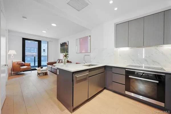 a kitchen with a stove and a sink