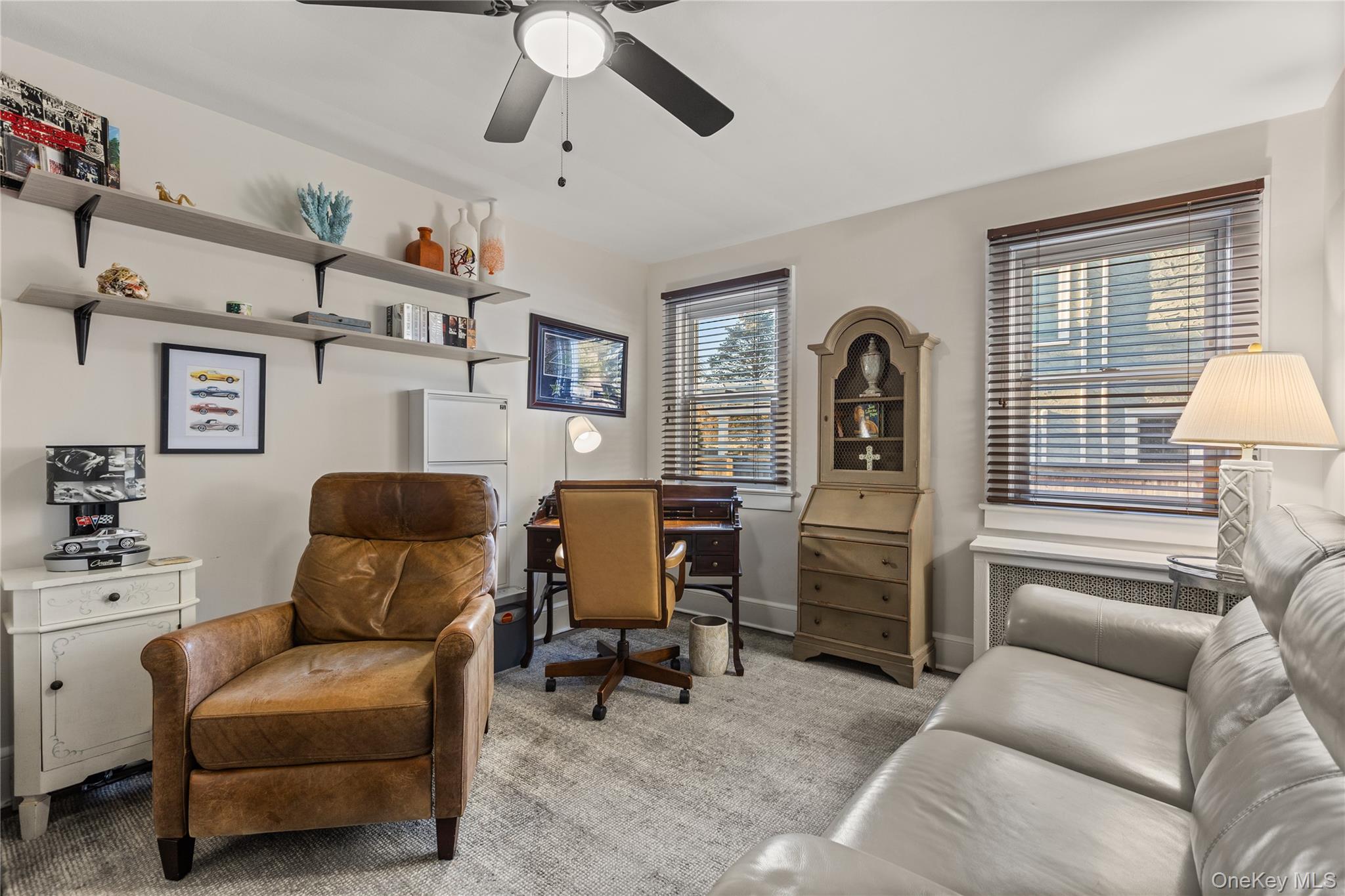 26 Community Road Bay Shore, NY 11706 - Photo 13 of 27 a living room with furniture and a window