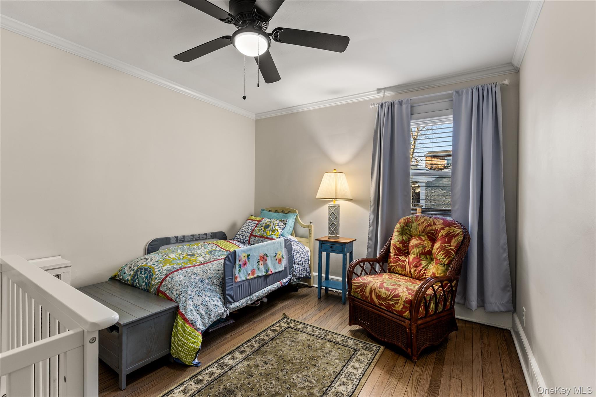 26 Community Road Bay Shore, NY 11706 - Photo 14 of 27 a bedroom with bed and a window