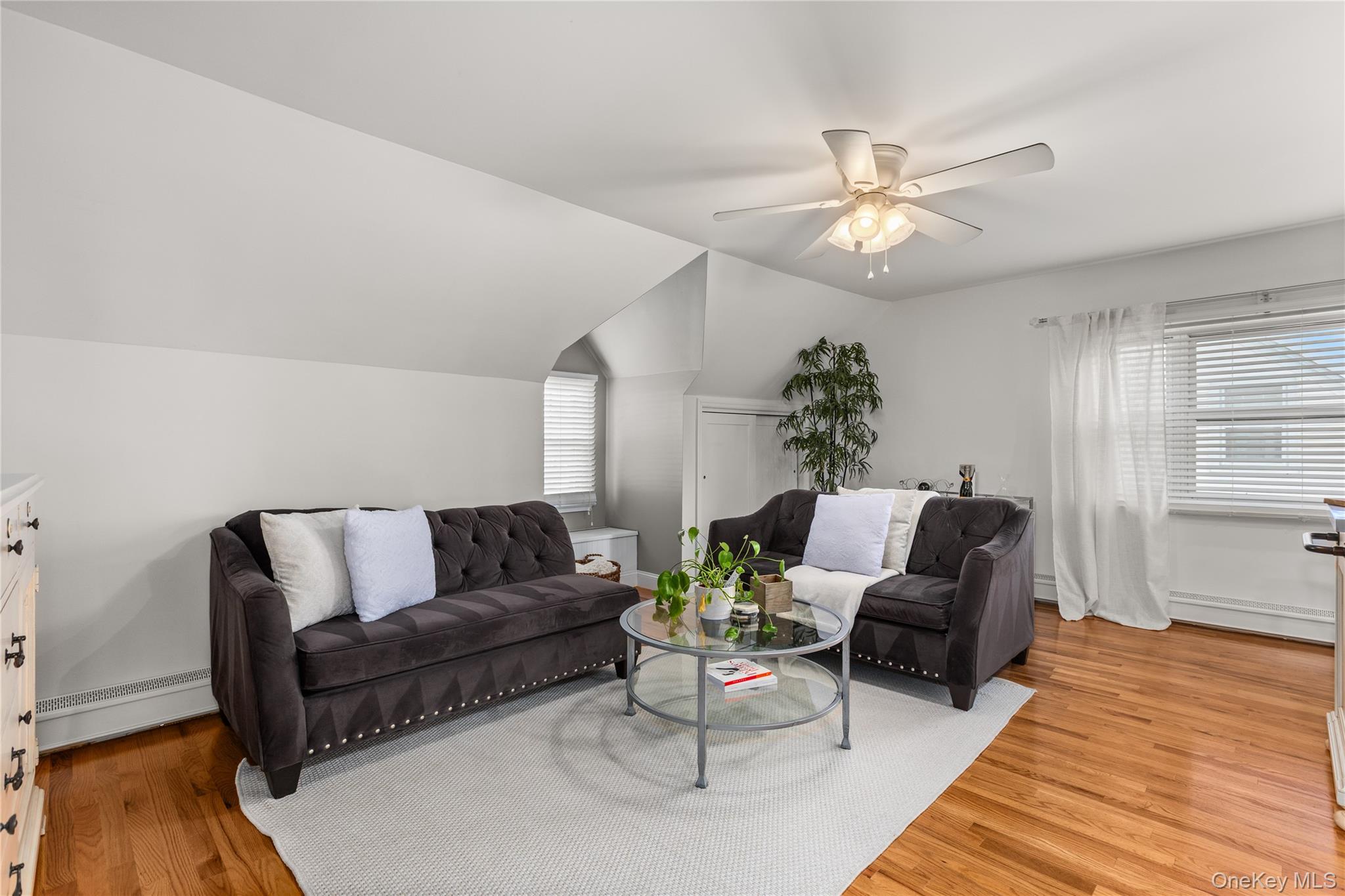 26 Community Road Bay Shore, NY 11706 - Photo 16 of 27 a living room with furniture and a rug