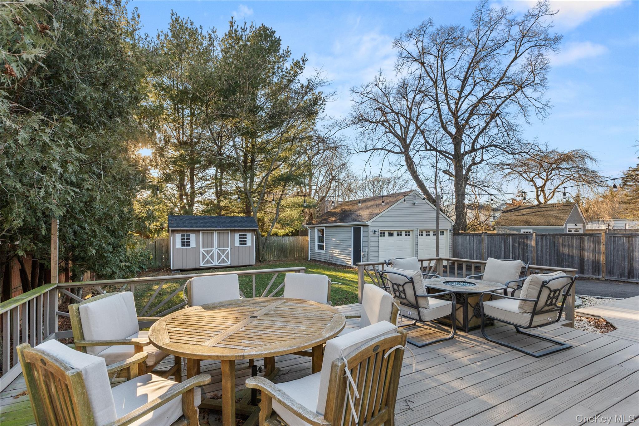 26 Community Road Bay Shore, NY 11706 - Photo 21 of 27 a view of a dinning table and chairs in the roof deck