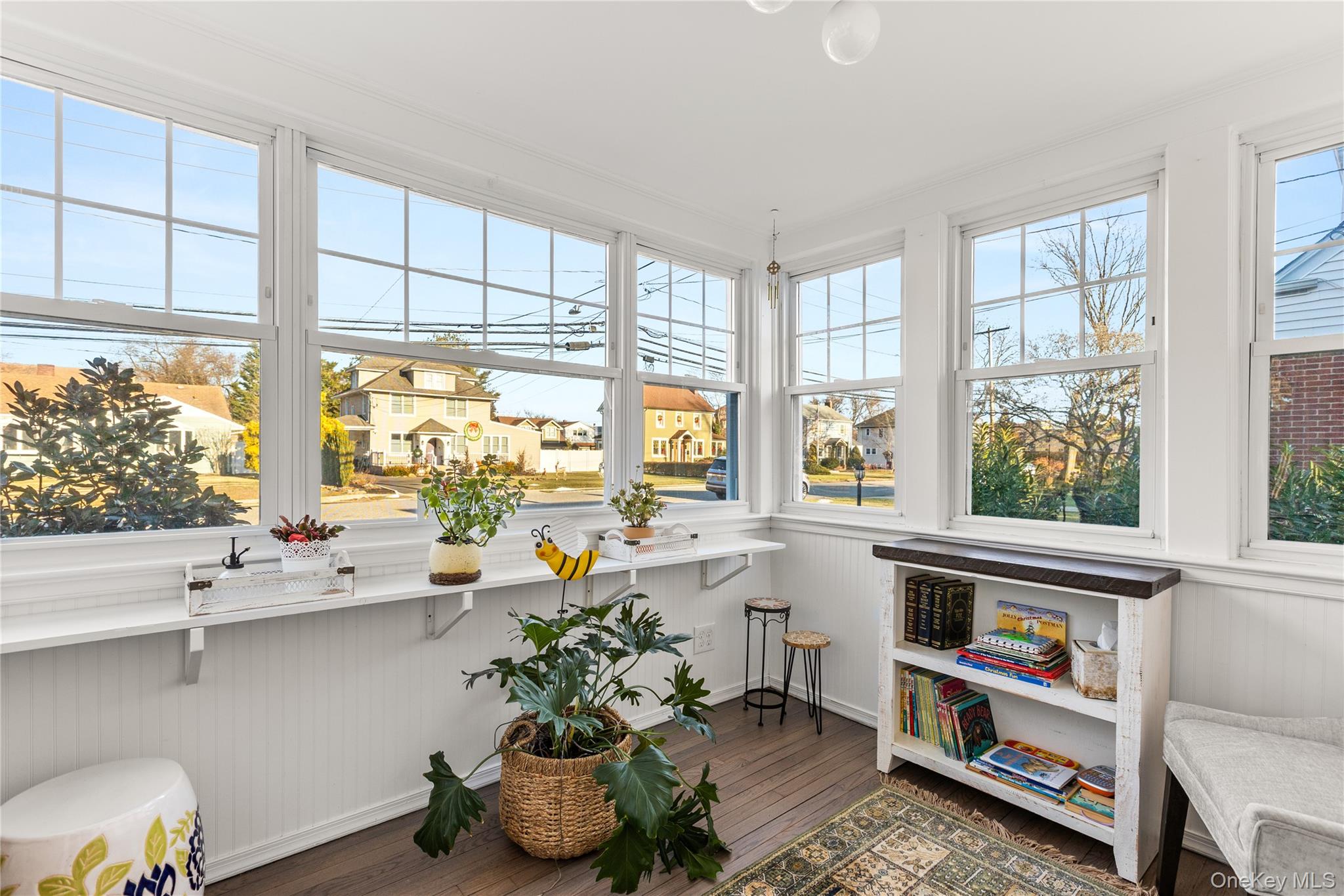 26 Community Road Bay Shore, NY 11706 - Photo 5 of 27 a kitchen with a large window and white appliances