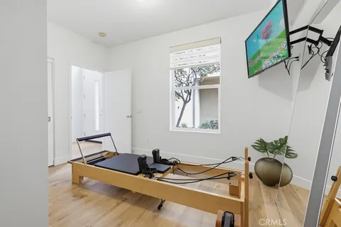 a view of a chairs and table in the backyard