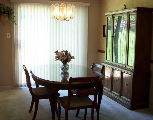 Dining Room. SPACIOUS DINING ROOM! NEW SLIDING GLASS DOOR LEADS TO PATIO AND PRIVATE BACKYARD