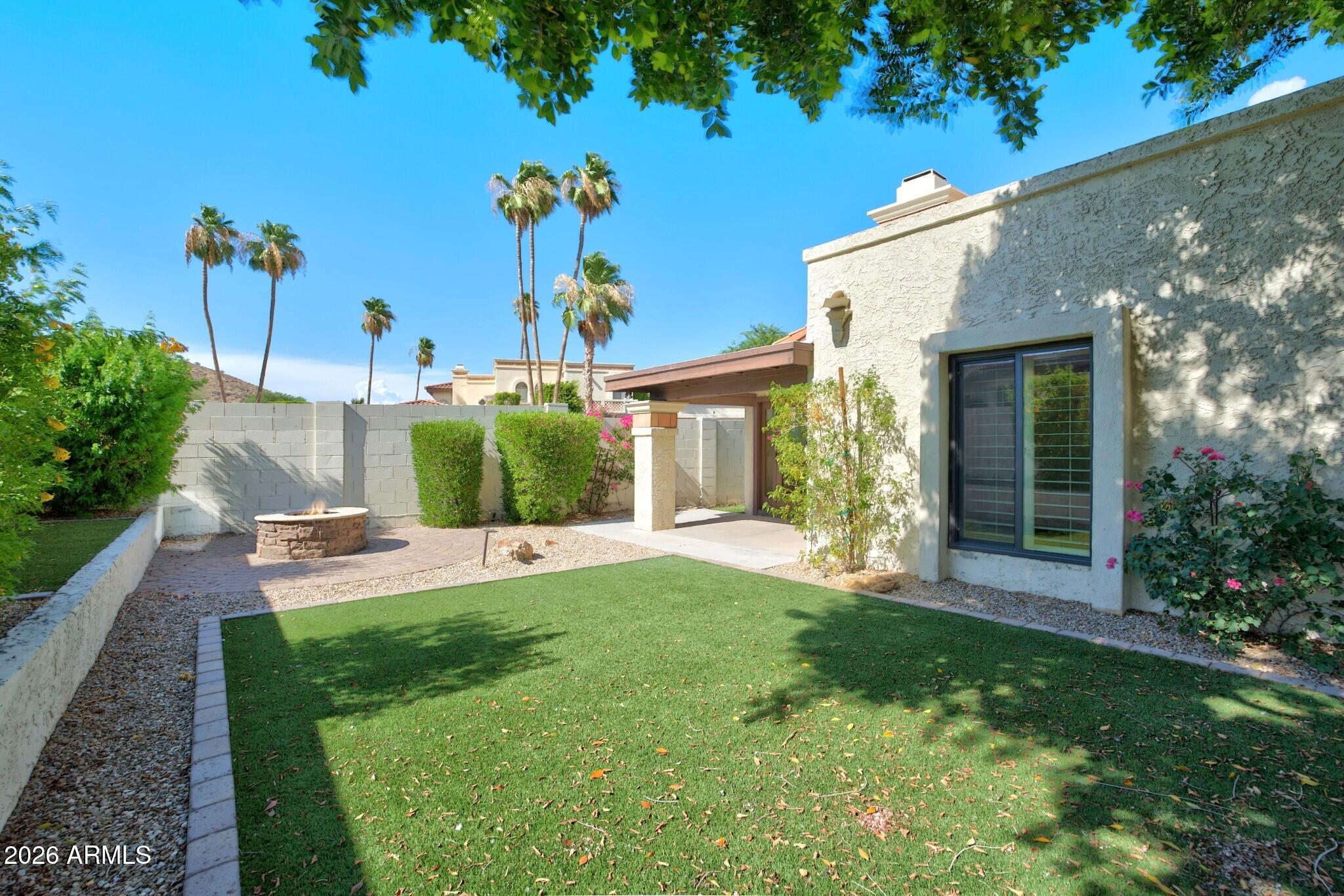 4615 East Monte Way Phoenix, AZ 85044 - Photo 10 of 35 a house view with a garden space