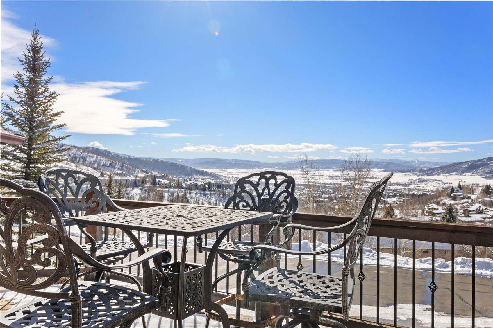 2324 Glacier Ridge, Unit B Steamboat Springs, CO 80487 - Photo 18 of 46 Snow covered deck with a mountain view and a balcony