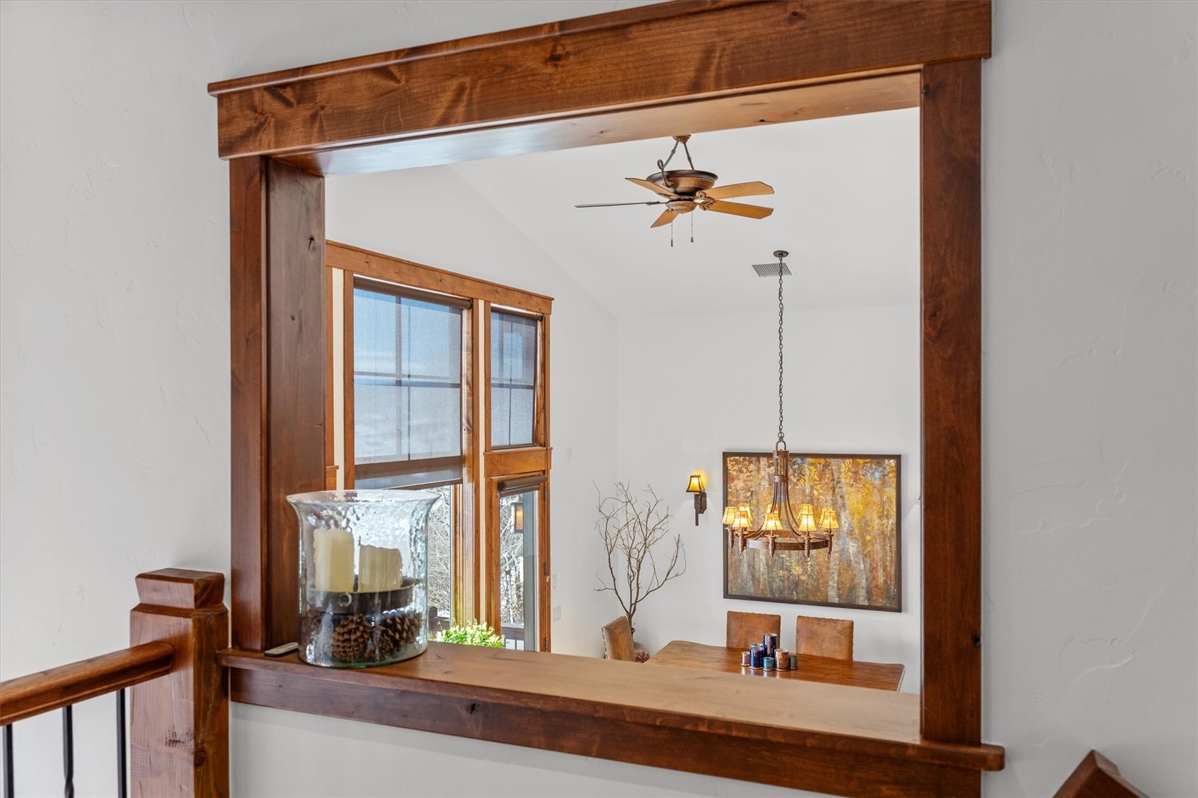 2324 Glacier Ridge, Unit B Steamboat Springs, CO 80487 - Photo 25 of 46 Detailed view of ceiling fan and a chandelier