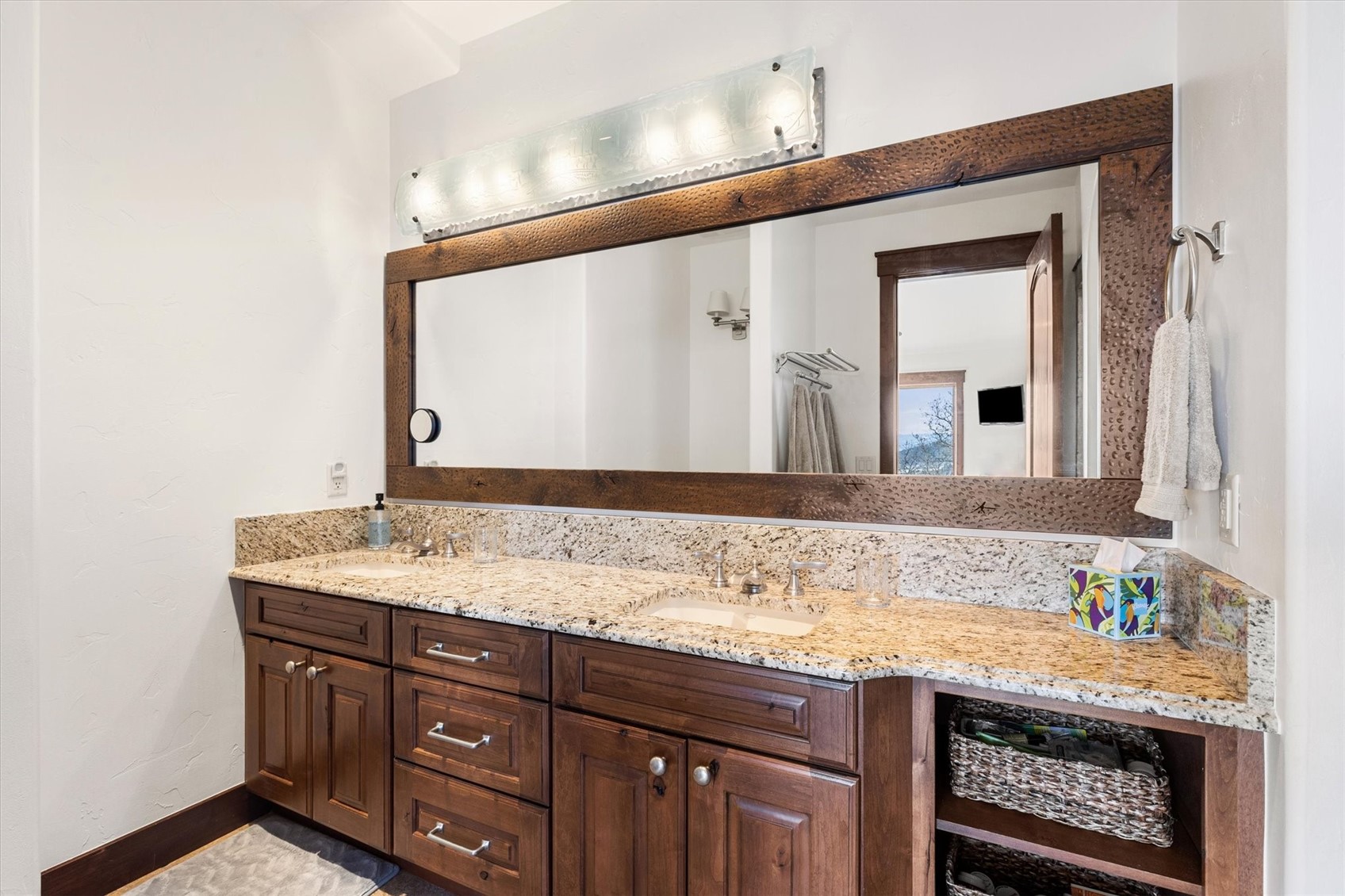 2324 Glacier Ridge, Unit B Steamboat Springs, CO 80487 - Photo 38 of 46 Bathroom featuring double vanity and baseboards