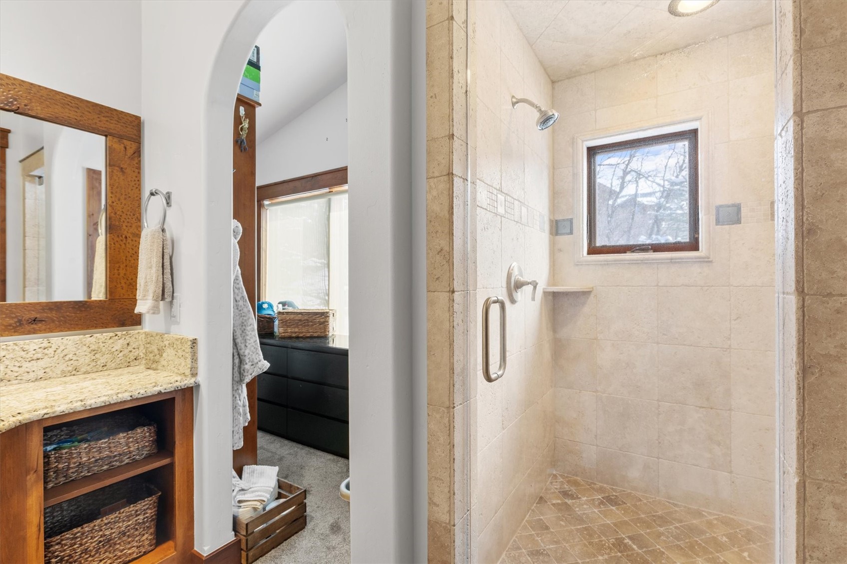 2324 Glacier Ridge, Unit B Steamboat Springs, CO 80487 - Photo 39 of 46 Full bath featuring a stall shower, light colored carpet, and vanity