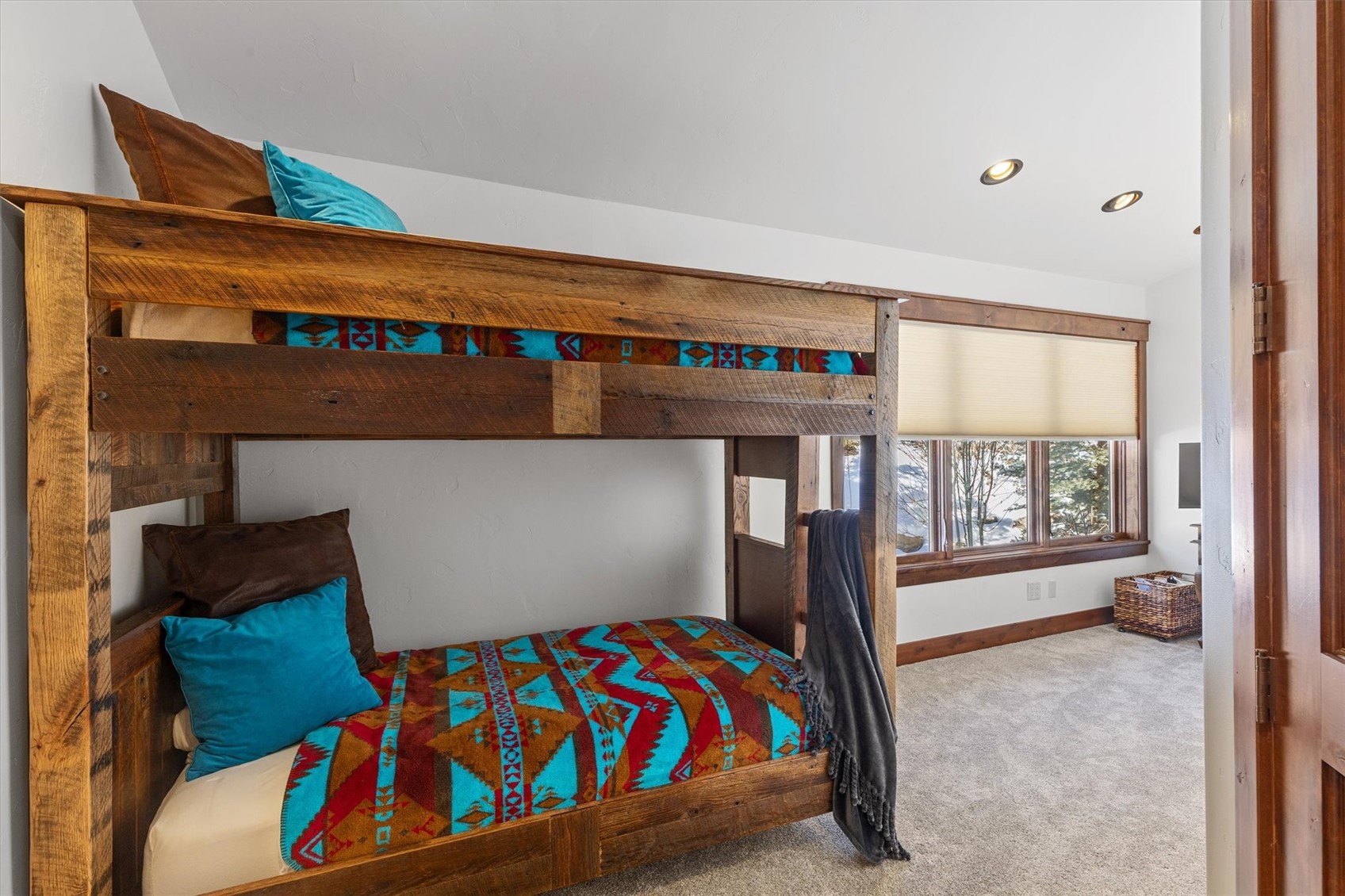 2324 Glacier Ridge, Unit B Steamboat Springs, CO 80487 - Photo 40 of 46 Bedroom with light colored carpet and recessed lighting