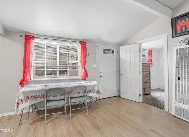 a livingroom with furniture and window