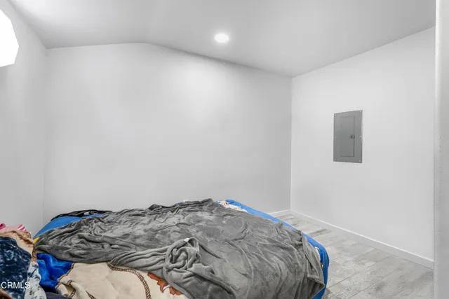 a bedroom with a bed