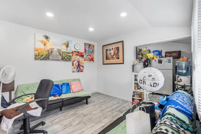 a living room with toys and a couch