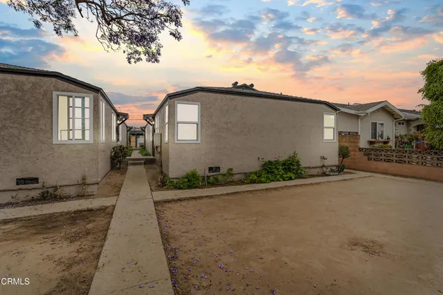 a view of a house with a roof deck