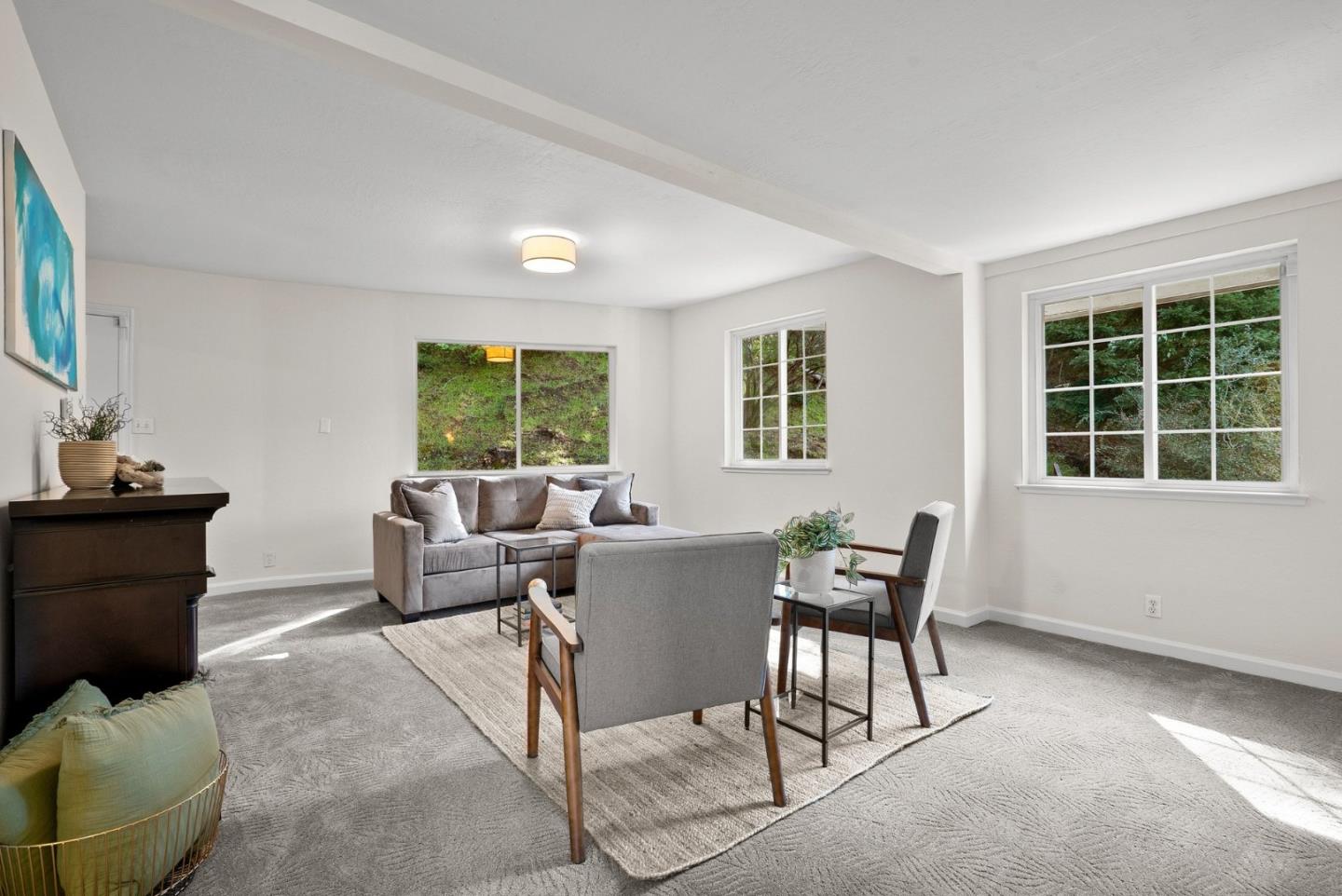 600 Cook Way Ben Lomond, CA 95005 - Photo 24 of 36 a living room with furniture and large windows