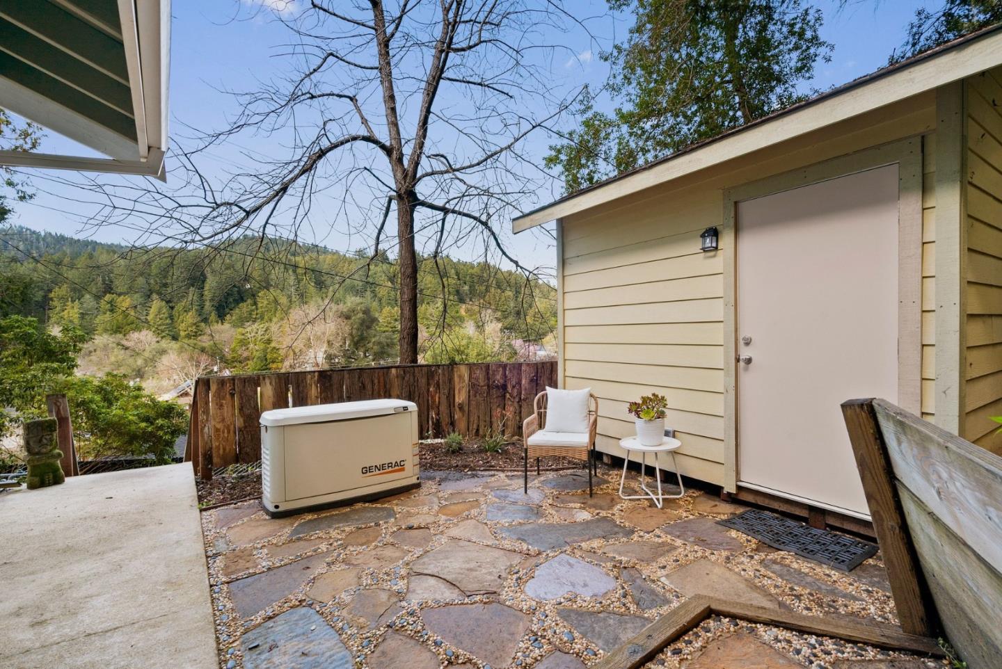 600 Cook Way Ben Lomond, CA 95005 - Photo 30 of 36 a view of backyard with a table and chair with wooden fence