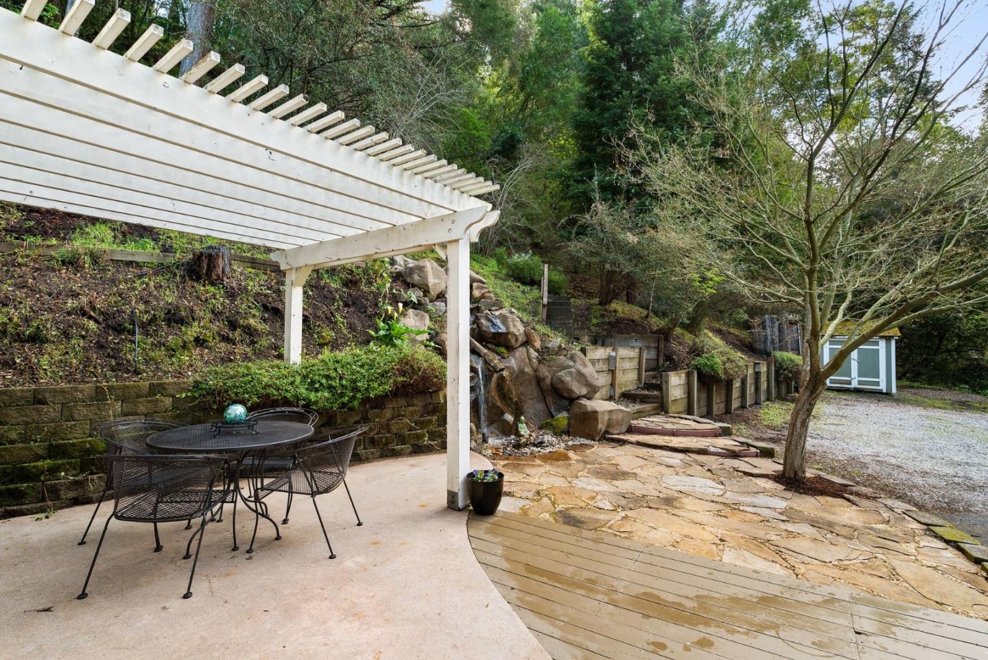 600 Cook Way Ben Lomond, CA 95005 - Photo 31 of 36 a view of a patio with table and chairs and potted plants