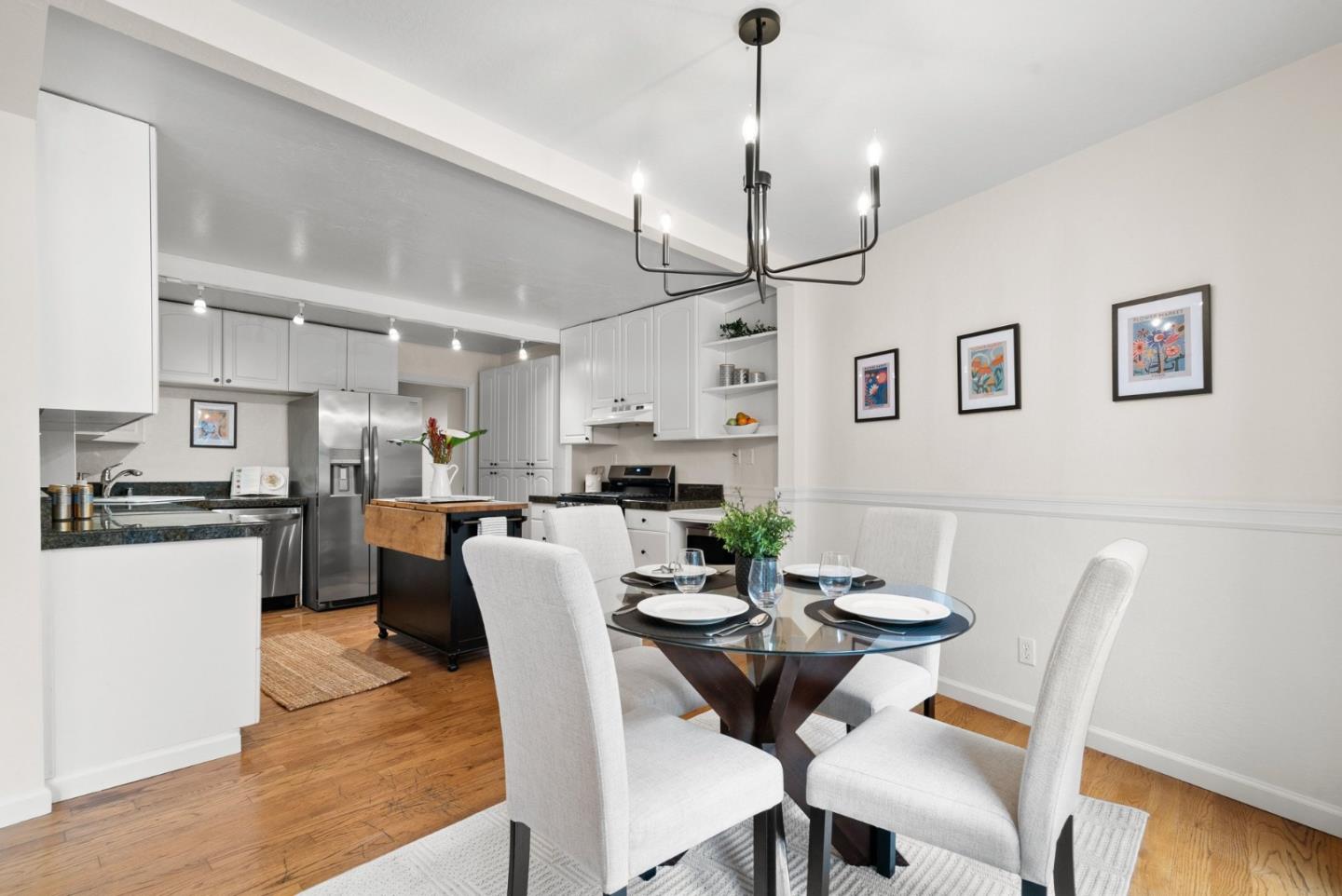 600 Cook Way Ben Lomond, CA 95005 - Photo 8 of 36 a view of a dining room with furniture wooden floor and a chandelier