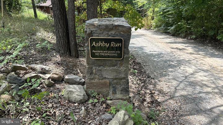 Cliff Lane Bluemont, VA 20135 - Photo 10 of 10 a view of a street sign under a large tree