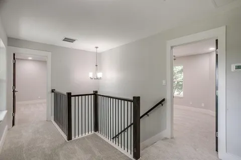 a view of a hallway with entryway