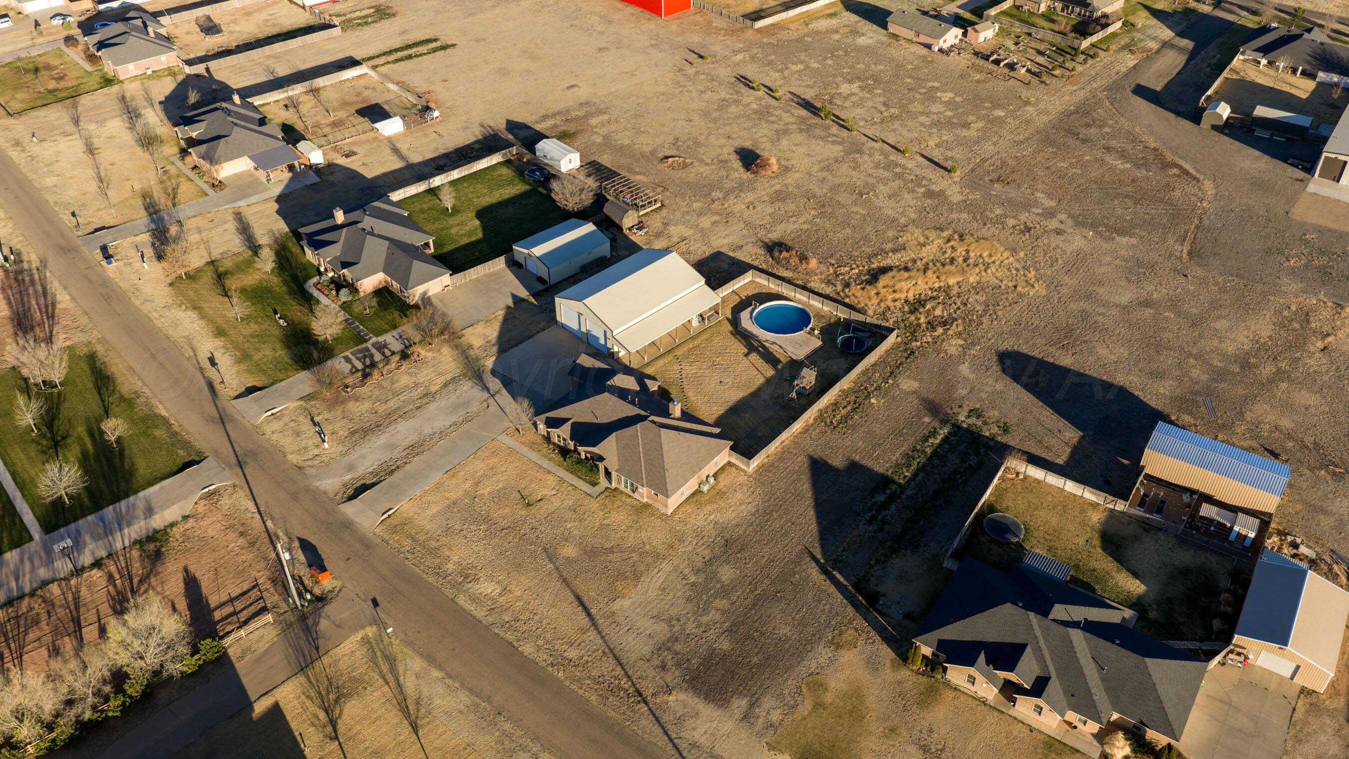 18400 Sundancer Lane Bushland, TX 79124 - Photo 50 of 58 an aerial view of residential houses with outdoor space