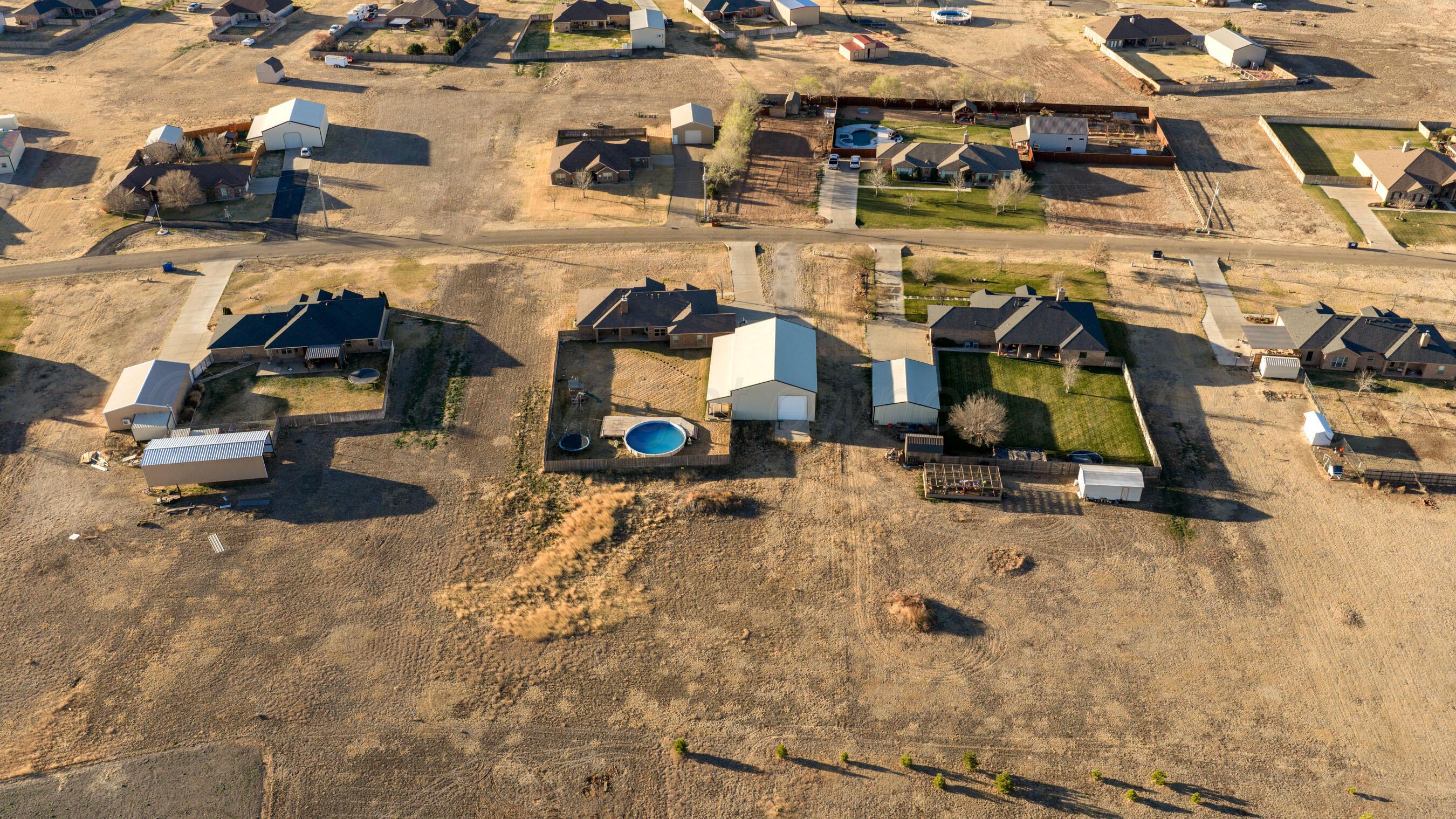 18400 Sundancer Lane Bushland, TX 79124 - Photo 57 of 58 an aerial view of residential houses with outdoor space