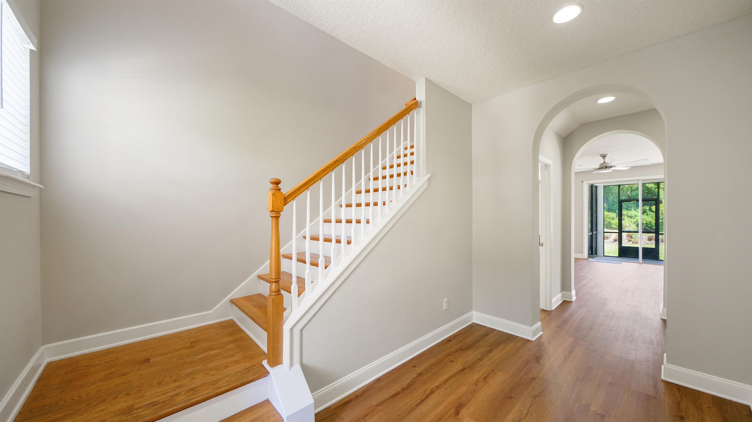 18 Amistad Drive, Unit 18 St. Augustine, FL 32086 - Photo 3 of 36 a view of entryway and hall with wooden floor