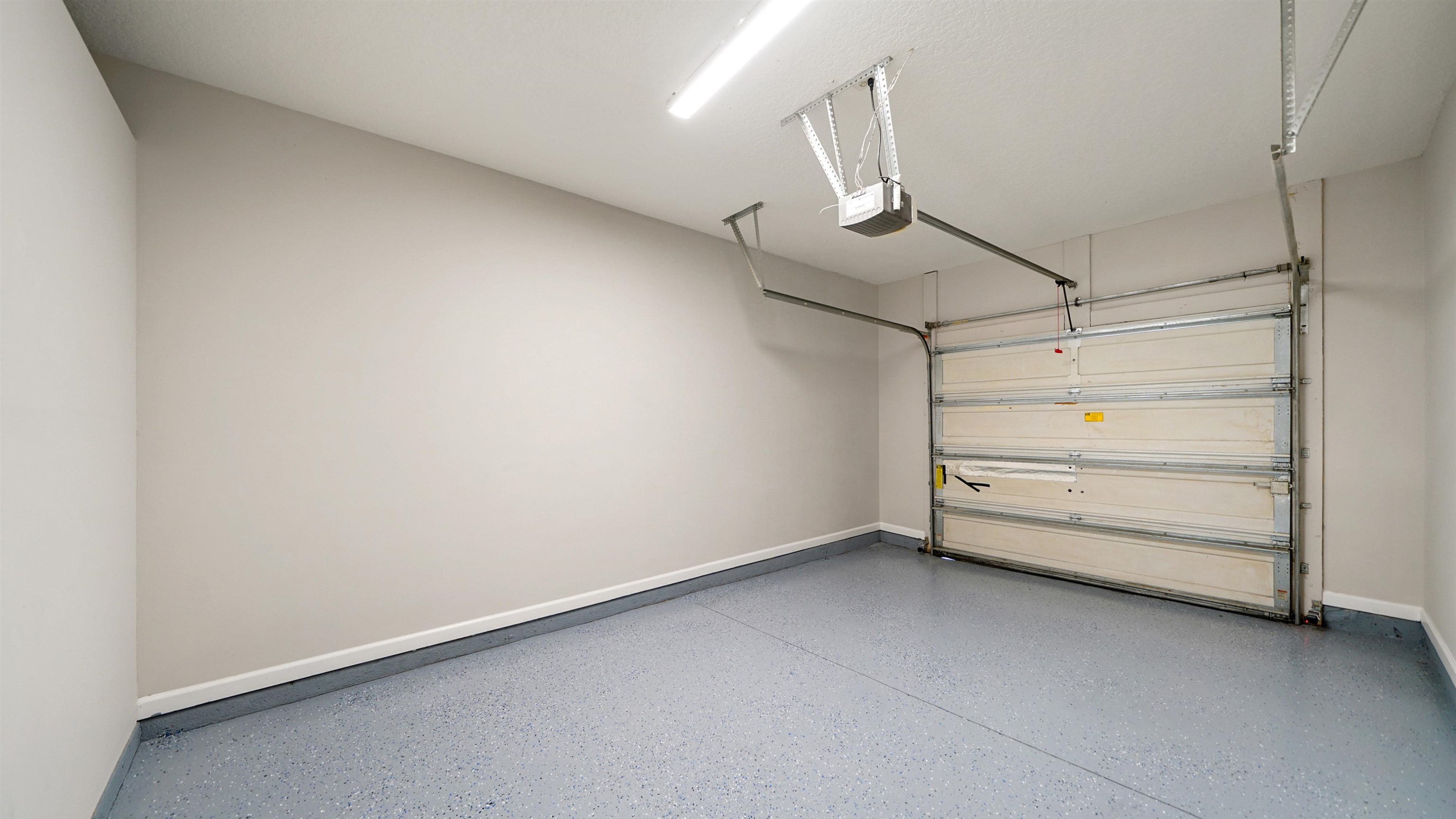 18 Amistad Drive, Unit 18 St. Augustine, FL 32086 - Photo 31 of 36 a view of a room with racks on the wall