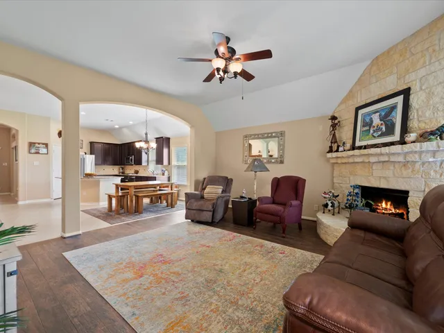 a spacious bedroom with a bed and a window