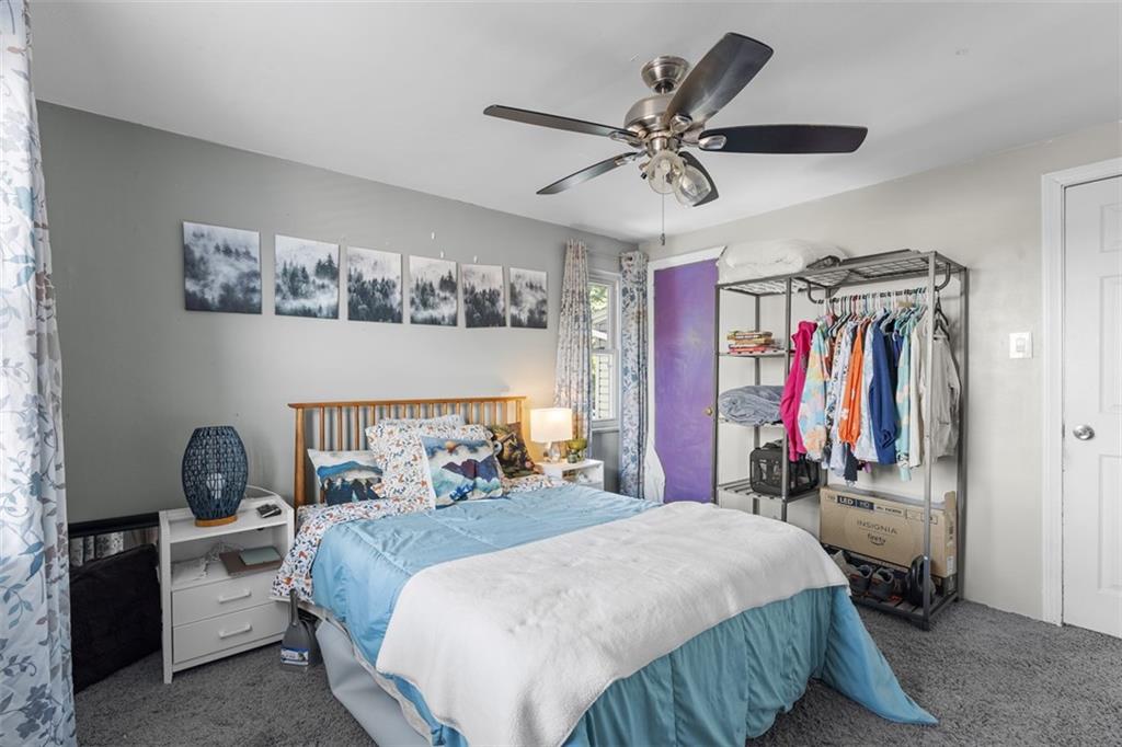 920 Mifflinridge Road Pittsburgh, PA 15207 - Photo 14 of 34 Main level bedroom comes with the free standing garment rack!