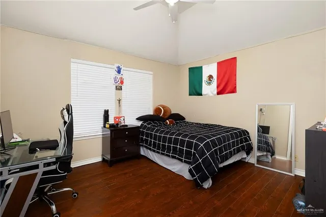 a bed room with a bed and a window