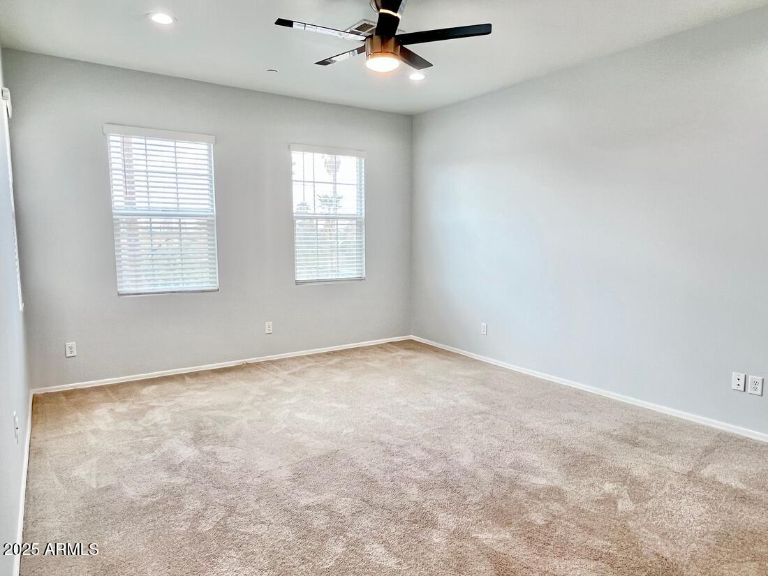 3434 North Longview Avenue, Unit 13 Phoenix, AZ 85014 - Photo 18 of 53 wooden floor in an empty room with a window