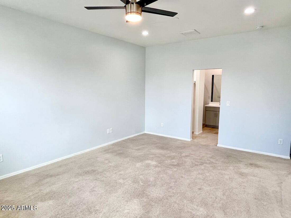 3434 North Longview Avenue, Unit 13 Phoenix, AZ 85014 - Photo 19 of 53 wooden floor in an empty room